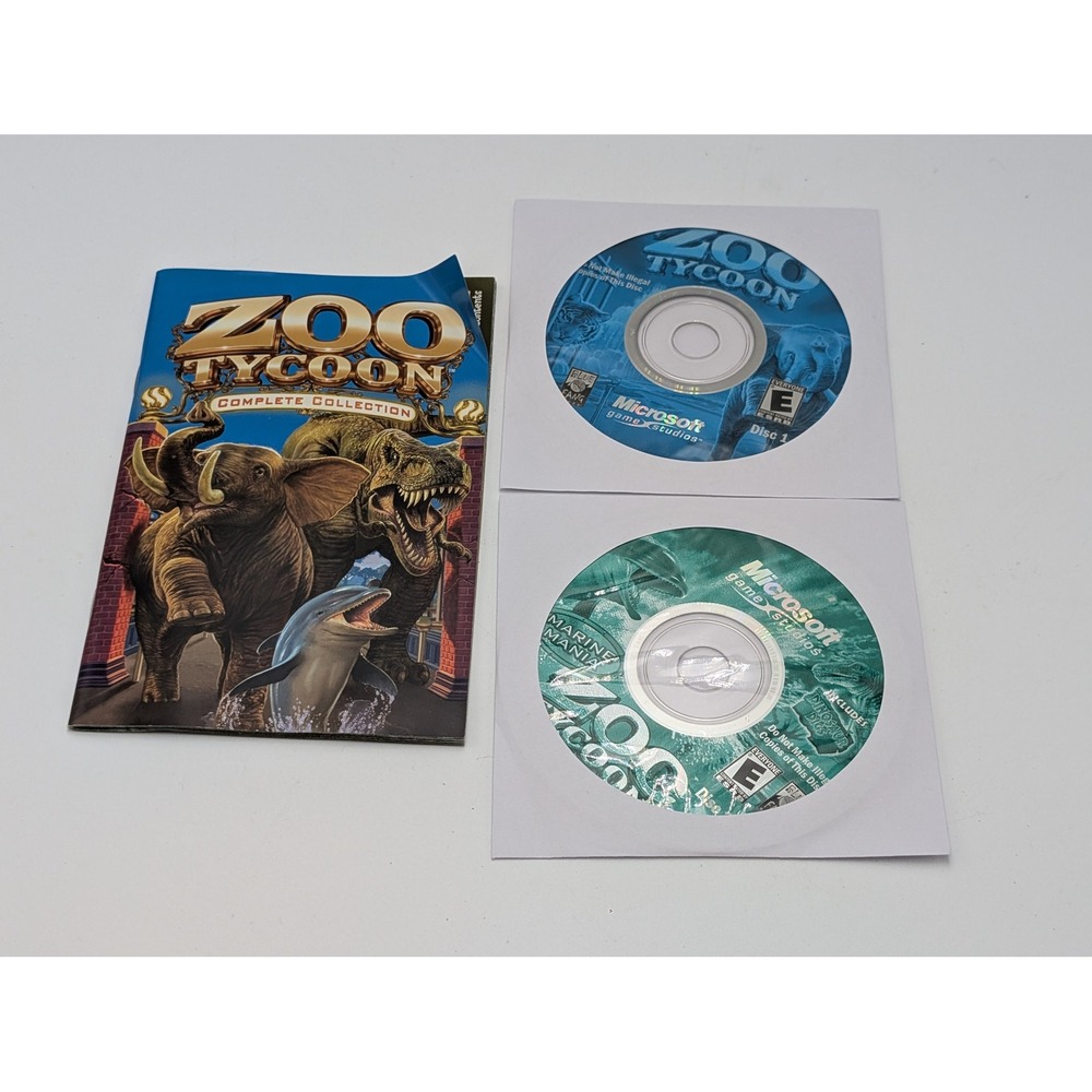 Microsoft Zoo Tycoon Complete Collection PC 2003 2-Disc Set With Manual NM Disc